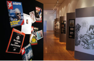 Begleitend zur Ausstellung ist für 19,90 Euro ein 160-seitiger Katalog mit farbgetreuen Abbildungen aller 120 gezeigten Karikaturen erhältlich. Foto: Mario Zgoll Begleitend zur Ausstellung ist für 19,90 Euro ein 160-seitiger Katalog mit farbgetreuen Abbildungen aller 120 gezeigten Karikaturen erhältlich. Foto: Mario Zgoll